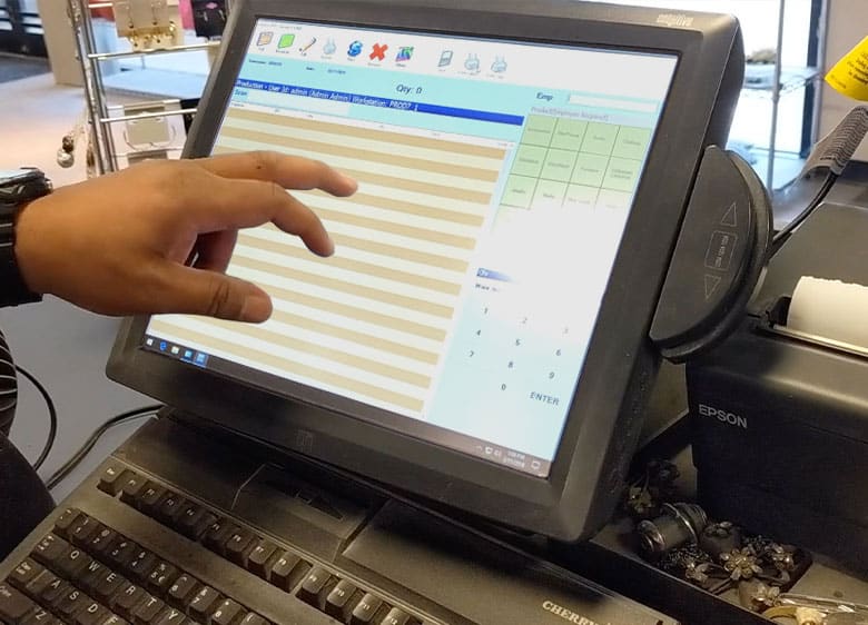 employee using a point of sale system
